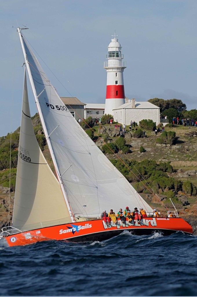 Haphazard skippered by Nick Edmunds, passes the Low Head lighthouse in 2009 race. - Hydro Tasmania Three Peaks Race © Phillip Biggs